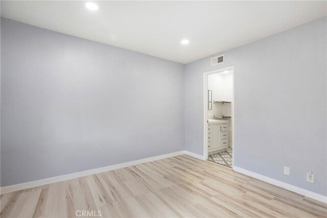 13261 Coast St, Garden Grove, CA 92844 - unfurnished room featuring light wood-style floors, recessed lighting, and baseboards