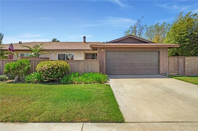 13261 Coast St, Garden Grove, CA 92844 - ranch-style home with driveway and a garage