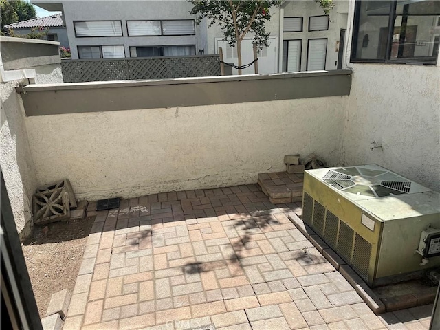 view of patio / terrace featuring fence