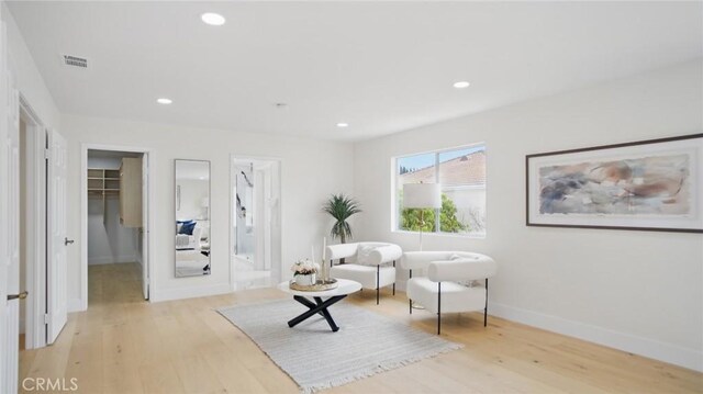 44 Statehouse Pl, Irvine, CA 92602 - living area with recessed lighting, light wood-style flooring, baseboards, and visible vents