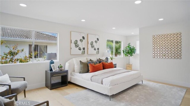44 Statehouse Pl, Irvine, CA 92602 - bedroom with recessed lighting and wood finished floors