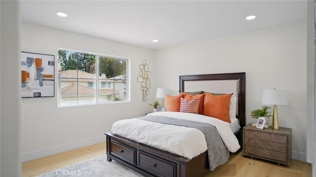 44 Statehouse Pl, Irvine, CA 92602 - bedroom with baseboards, recessed lighting, and light wood-style flooring
