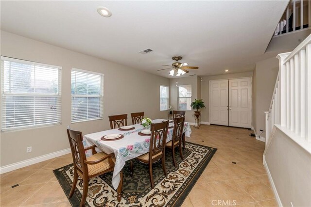 dining space featuring light tile patterned flooring, visible vents, baseboards, and recessed lighting