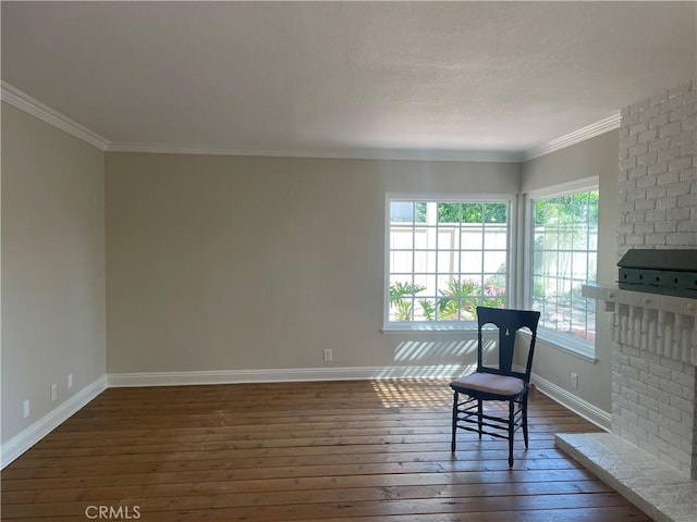 22191 Apache Dr, Lake Forest, CA 92630 - sitting room with dark wood-style flooring, baseboards, and ornamental molding