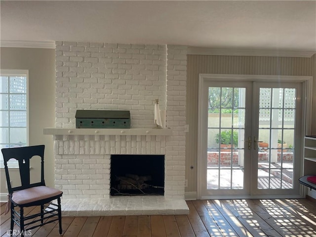 22191 Apache Dr, Lake Forest, CA 92630 - doorway featuring baseboards, ornamental molding, hardwood / wood-style flooring, and a fireplace