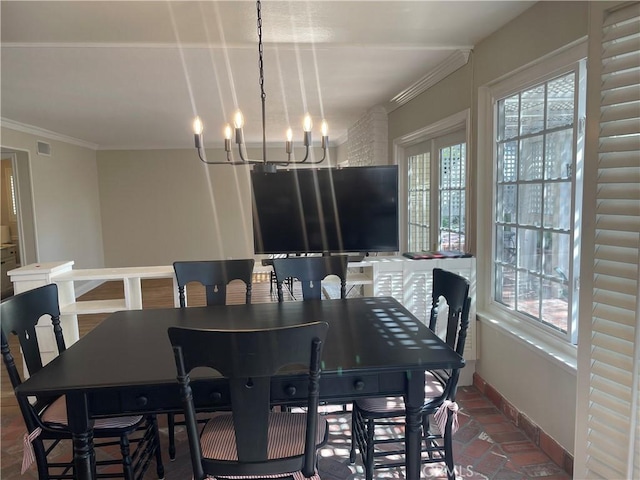 22191 Apache Dr, Lake Forest, CA 92630 - dining space featuring baseboards, visible vents, ornamental molding, and a chandelier