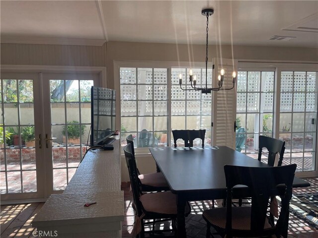 22191 Apache Dr, Lake Forest, CA 92630 - dining room with visible vents, a notable chandelier, and french doors