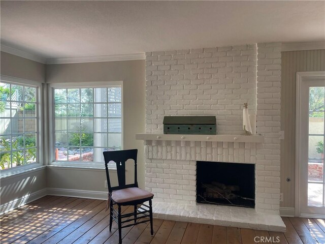 22191 Apache Dr, Lake Forest, CA 92630 - unfurnished room featuring a fireplace, baseboards, and hardwood / wood-style floors