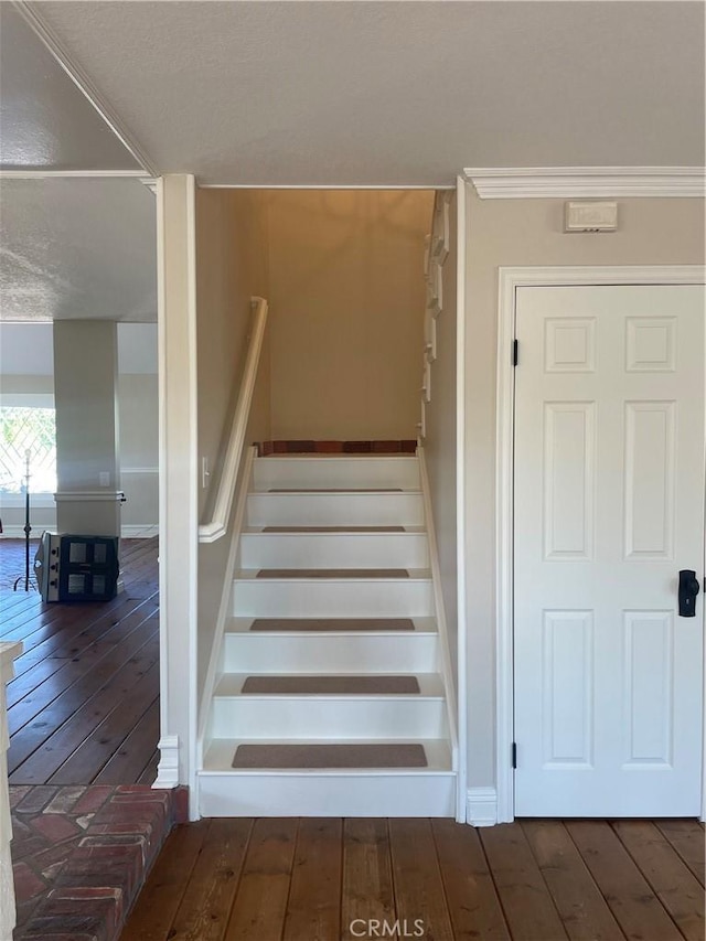 22191 Apache Dr, Lake Forest, CA 92630 - stairs with wood-type flooring and baseboards
