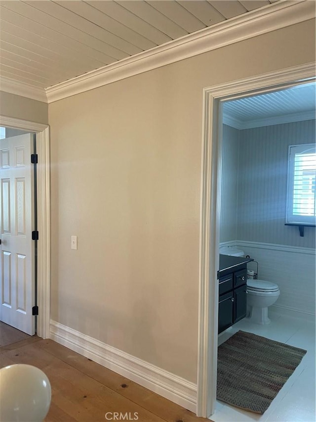 22191 Apache Dr, Lake Forest, CA 92630 - bathroom featuring crown molding, toilet, wood finished floors, and vanity