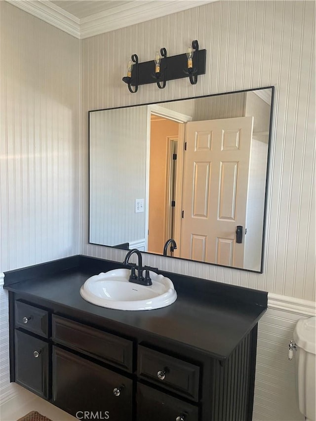 22191 Apache Dr, Lake Forest, CA 92630 - half bath with vanity, ornamental molding, and toilet
