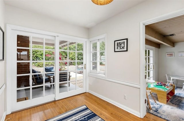 322 Calle De Arboles, Redondo Beach, CA 90277 - entryway with wood finished floors, healthy amount of natural light, and baseboards