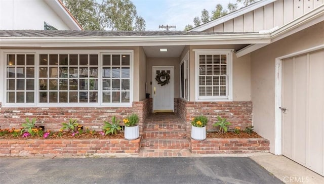 322 Calle De Arboles, Redondo Beach, CA 90277 - property entrance featuring board and batten siding, stucco siding, and brick siding