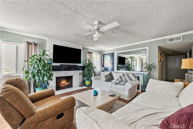 13 Lighthouse Street 13 & 15, Marina Del Rey, CA 90292 - living area with crown molding, ceiling fan, wood finished floors, a textured ceiling, and a fireplace