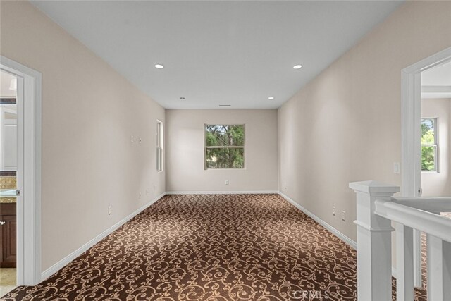 21 Deergrass, Irvine, CA 92618 - spare room featuring carpet, healthy amount of natural light, baseboards, and recessed lighting