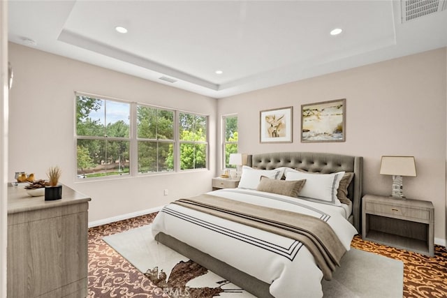 21 Deergrass, Irvine, CA 92618 - bedroom featuring a tray ceiling, recessed lighting, baseboards, and carpet floors
