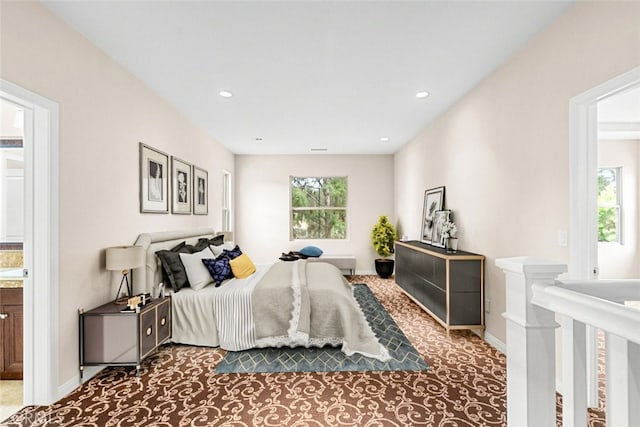 21 Deergrass, Irvine, CA 92618 - carpeted bedroom with multiple windows, recessed lighting, baseboards, and connected bathroom