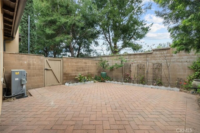 21 Deergrass, Irvine, CA 92618 - fenced backyard with a gate and a patio area