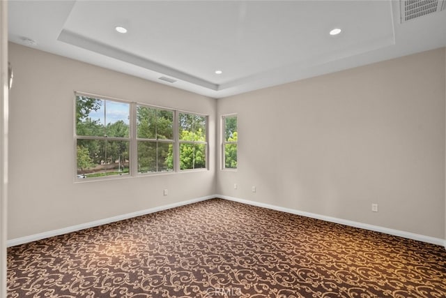 21 Deergrass, Irvine, CA 92618 - carpeted empty room with a tray ceiling, recessed lighting, plenty of natural light, baseboards, and a smoke detector