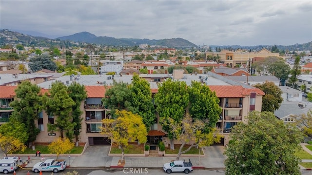 aerial view featuring a residential view and a mountain view