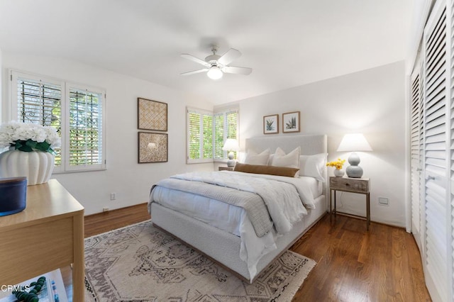 bedroom featuring wood finished floors and a ceiling fan