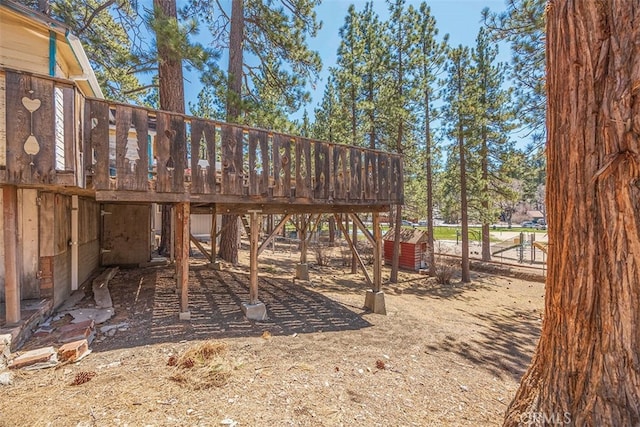 view of jungle gym with a wooden deck