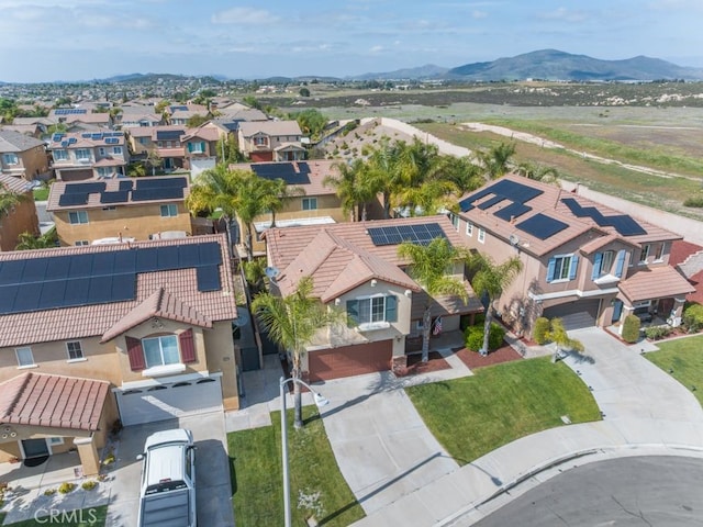 drone / aerial view featuring a mountain view and a residential view