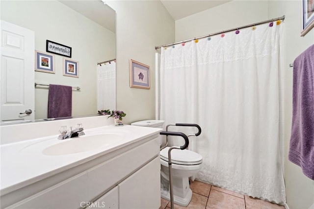 bathroom with toilet, a shower with curtain, tile patterned flooring, and vanity