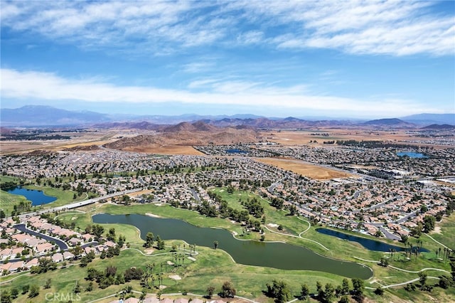 aerial view featuring a residential view, view of golf course, and a water and mountain view