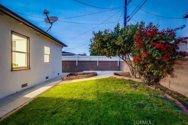 view of yard with a fenced backyard