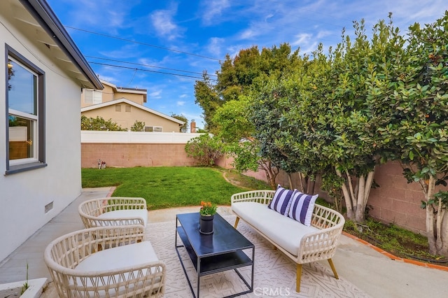 view of patio / terrace with an outdoor hangout area and a fenced backyard