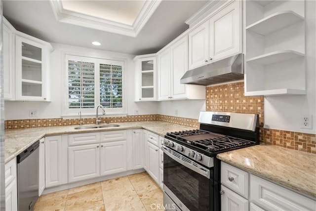 kitchen featuring open shelves, under cabinet range hood, tasteful backsplash, a sink, and stainless steel appliances