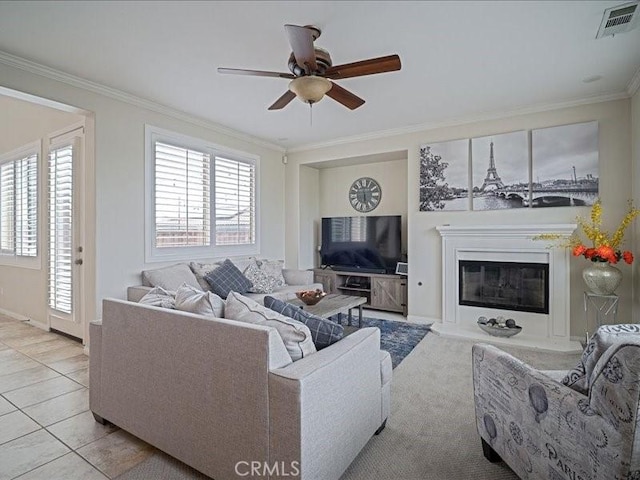 37192 Amateur Way, Beaumont, CA 92223 - living room with a ceiling fan, crown molding, visible vents, and plenty of natural light