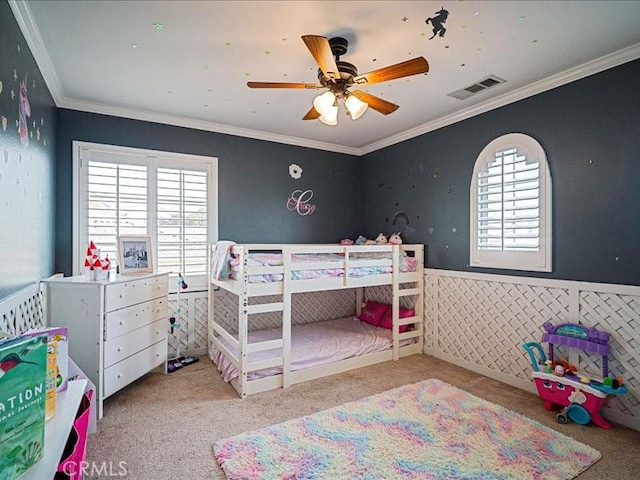 37192 Amateur Way, Beaumont, CA 92223 - carpeted bedroom with wainscoting, visible vents, ceiling fan, and crown molding
