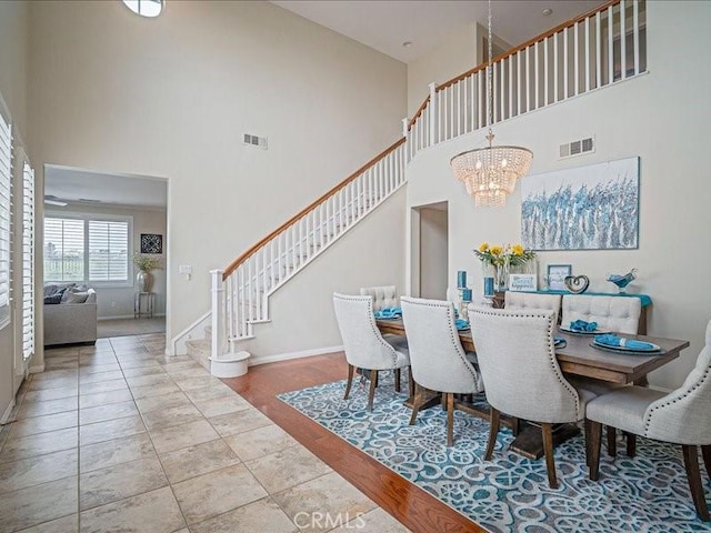 37192 Amateur Way, Beaumont, CA 92223 - dining area with a high ceiling, stairs, and visible vents