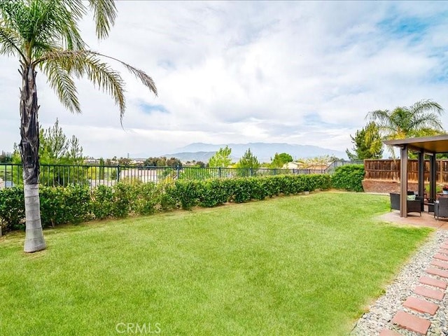 37192 Amateur Way, Beaumont, CA 92223 - view of yard featuring a fenced backyard and a mountain view