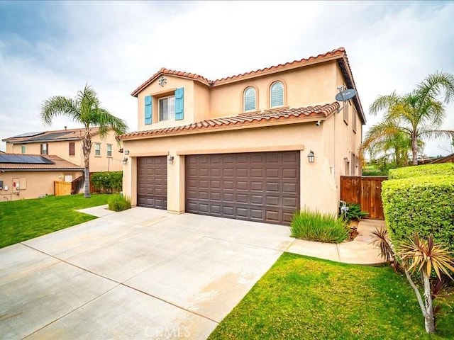 37192 Amateur Way, Beaumont, CA 92223 - mediterranean / spanish-style house featuring fence, a tiled roof, stucco siding, driveway, and a garage