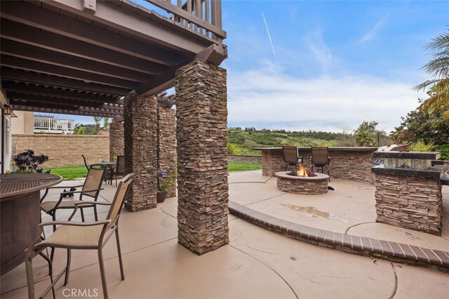 4 Chisholm Trl, Trabuco Canyon, CA 92679 - view of patio featuring an outdoor fire pit