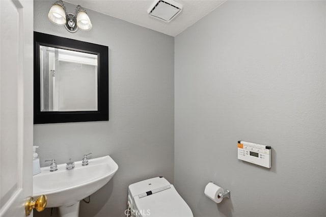 4 Chisholm Trl, Trabuco Canyon, CA 92679 - half bath featuring a sink and toilet