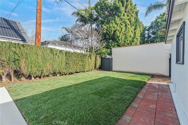 view of yard with fence