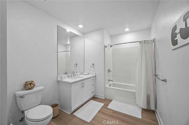3713 Rivington, Irvine, CA 92612 - bathroom with vanity, shower / tub combo with curtain, wood finished floors, toilet, and recessed lighting