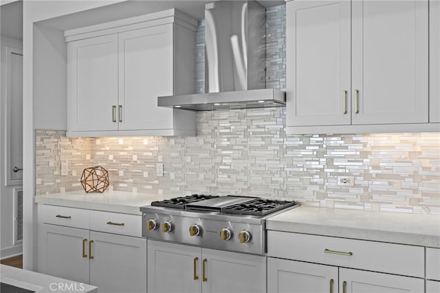 3713 Rivington, Irvine, CA 92612 - kitchen with wall chimney exhaust hood, stainless steel gas cooktop, white cabinetry, and tasteful backsplash