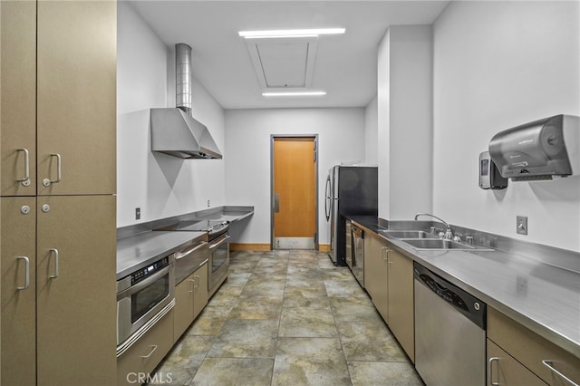 3713 Rivington, Irvine, CA 92612 - kitchen featuring stone finish flooring, appliances with stainless steel finishes, stainless steel counters, a sink, and baseboards