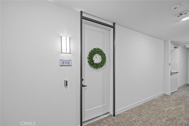 3713 Rivington, Irvine, CA 92612 - hallway with carpet floors and baseboards