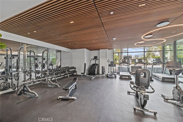 3713 Rivington, Irvine, CA 92612 - exercise room featuring wooden ceiling, floor to ceiling windows, and plenty of natural light