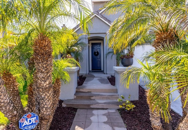 7607 Corona Valley Ave, Eastvale, CA 92880 - entrance to property with stucco siding and a garage