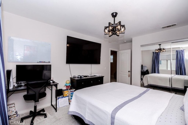 7607 Corona Valley Ave, Eastvale, CA 92880 - carpeted bedroom with a chandelier, an office area, and a closet
