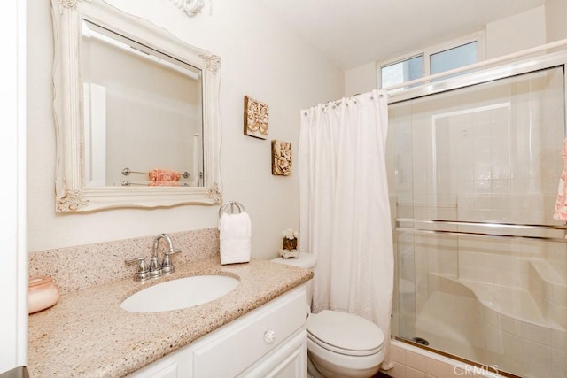 7607 Corona Valley Ave, Eastvale, CA 92880 - bathroom featuring a stall shower, toilet, and vanity