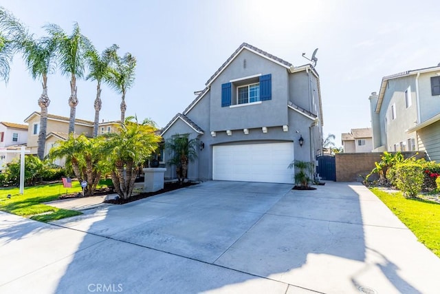 7607 Corona Valley Ave, Eastvale, CA 92880 - traditional-style home featuring a garage, concrete driveway, and stucco siding