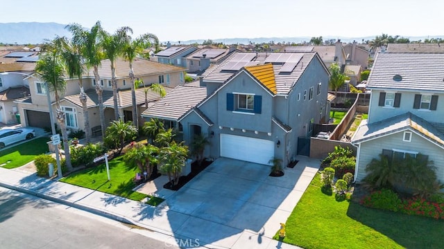7607 Corona Valley Ave, Eastvale, CA 92880 - aerial perspective of suburban area with mountains